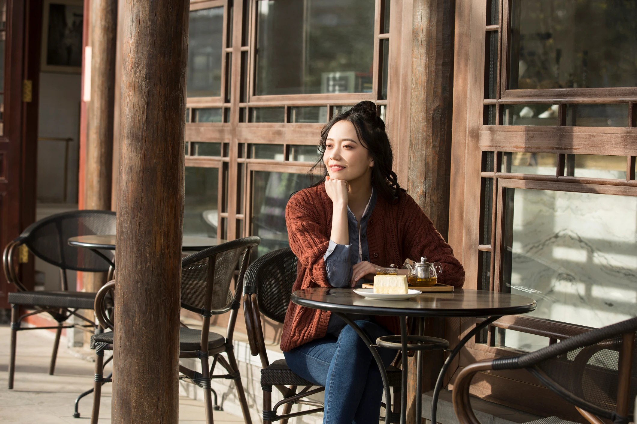 Chinese white-collar female enjoying afternoon tea in sidewalk cafe – stock photo Chinese white-collar female enjoying afternoon tea in sidewalk cafe – stock photo